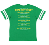 A green South Africa RWC 23 Champions Football Tee that says road to victory, produced by WRS LAT.