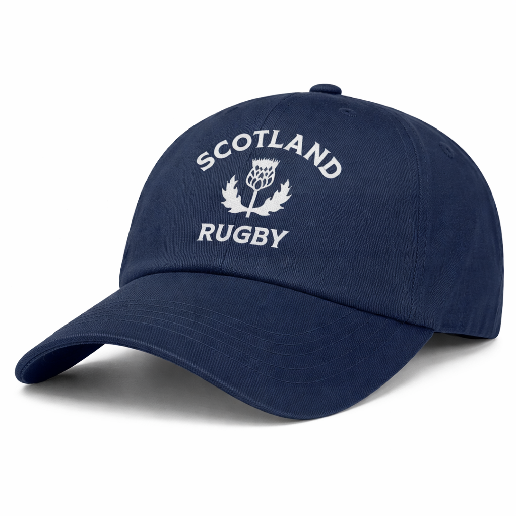 The EMB S&S Activewear Nations of Rugby Scotland Dad Cap features "Scotland Rugby" and a thistle embroidered in white on navy blue cotton twill, giving it a classic dad cap style.
