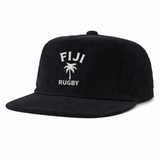 The EMB Weld Nations of Rugby Fiji Corduroy Field Trip Cap is a black cap with bold white "FIJI RUGBY" text and a palm tree graphic—perfect for any Fiji Rugby supporter.