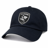 The Sharks Crest Cotton Twill Dad Cap by EMB S&S Activewear features a navy blue design with a front patch displaying "The Sharks Durban" and shark logo—ideal for South Africa rugby fans.