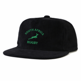 The EMB Weld Nations of Rugby South Africa Corduroy Field Trip Cap features black corduroy, embroidered green “South Africa Rugby” text, and a springbok logo—the perfect collectible cap for any rugby fan.