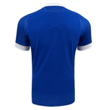 Royal blue short-sleeved Samoa Authentic Matchday Home Jersey 23/24 by Macron with white trim on sleeves, displayed from the back.