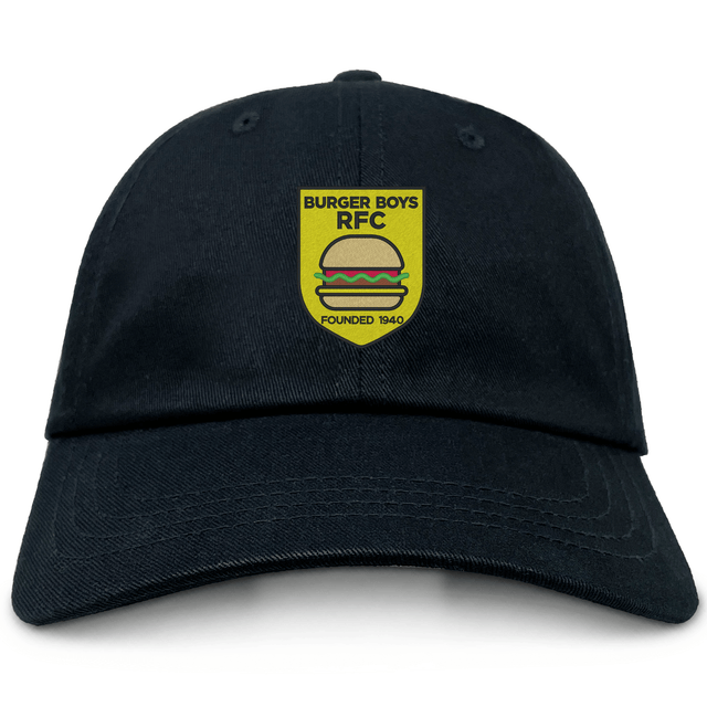 The Burger Boys RFC Adult Low-Profile Cotton Twill Dad Cap by EMB S&S Activewear features an embroidered yellow and green shield logo with "BURGER BOYS RFC FOUNDED 1940" and a hamburger graphic, made from quality cotton twill for comfort and durability.