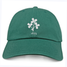 The Nations of Rugby Ireland Vintage Dad Cap by EMB S&S Activewear features an embroidered white clover leaf and "1875" design for a classic Irish vintage look.
