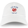 The Les Bleus France Rugby Dad Cap by EMB S&S Activewear is a white cotton twill hat featuring a red rooster and blue "LES BLEUS FRANCE RUGBY" text—a must-have for any France Rugby fan.