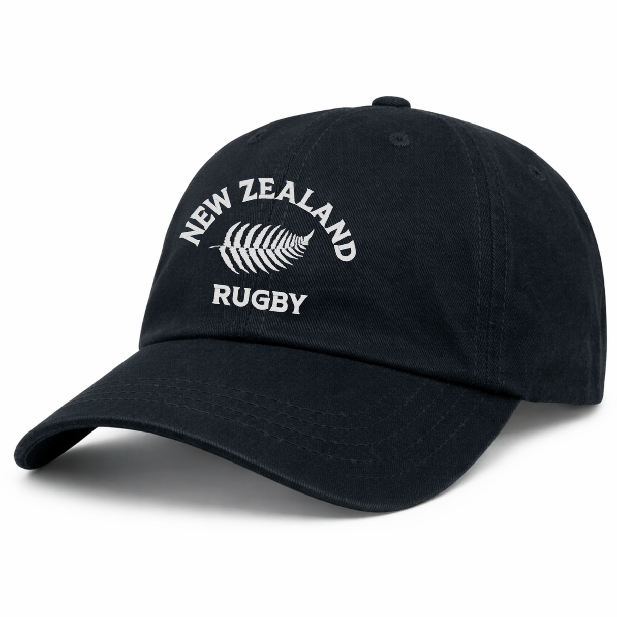 The Nations of Rugby New Zealand Dad Cap by EMB S&S Activewear is a black cotton twill hat with "New Zealand Rugby" and a white fern embroidered on the front, featuring a classic dad cap style.