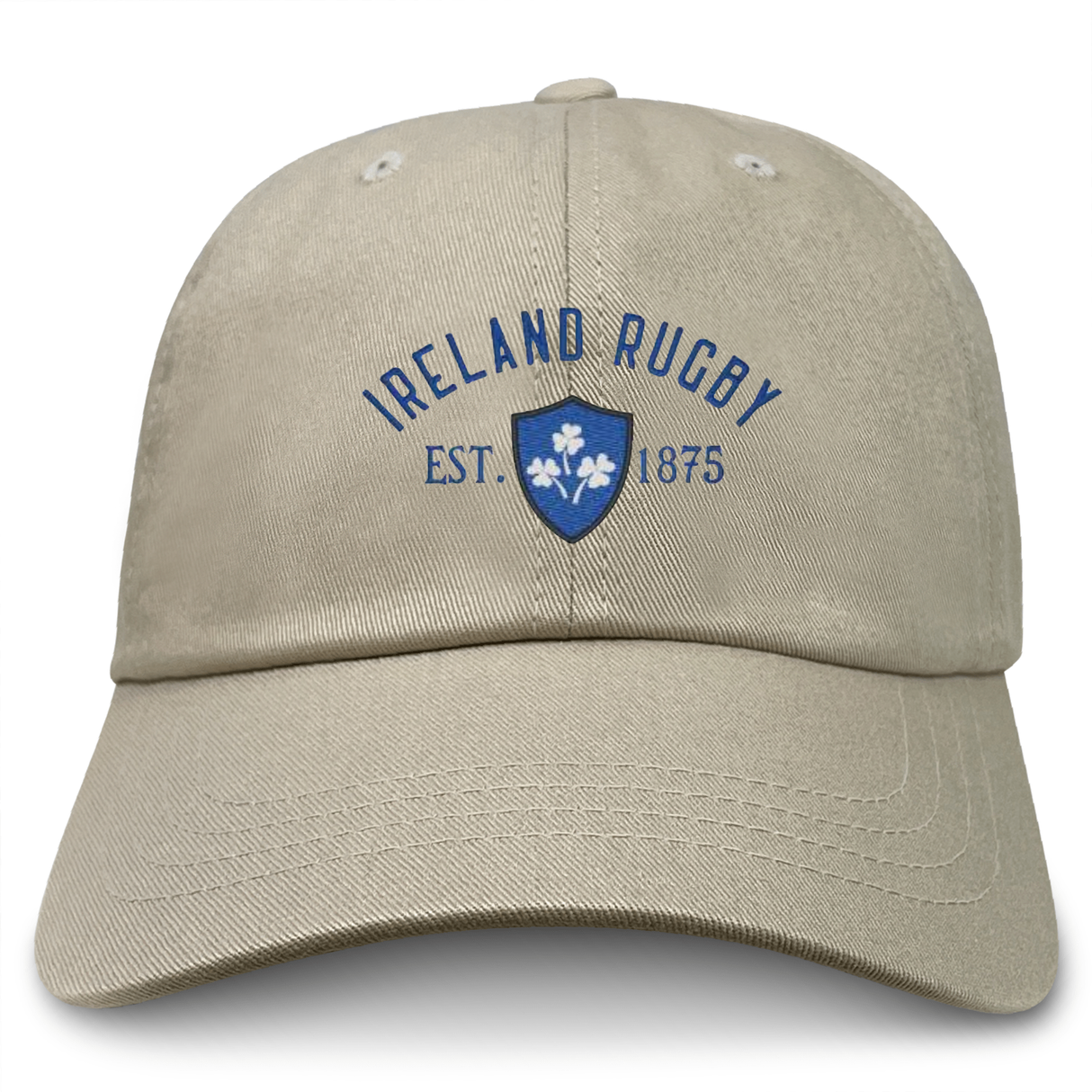 The EMB S&S Activewear Ireland Rugby 1875 Navy Logo Dad Cap features an "Ireland Rugby Est. 1875" design with a blue shield and shamrock, embroidered on the front, and is made from soft cotton twill for comfort and style.