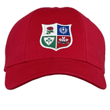 The Ellis Rugby British Rugby 1971 Lions Tour Cap nods to the iconic tour with a four-part shield emblem featuring a rose, thistle, clover, and dragon. Its slightly curved brim enhances its classic Ellis Rugby style.