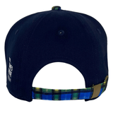 The Ellis Rugby Doddie Weir Scotland Cap's back view highlights its navy blue color, plaid adjustable strap, and metal buckle. Made from 100% organic cotton, this cap effortlessly combines sporty elegance with eco-friendly appeal—a must-have for rugby fans and sustainable fashion lovers.