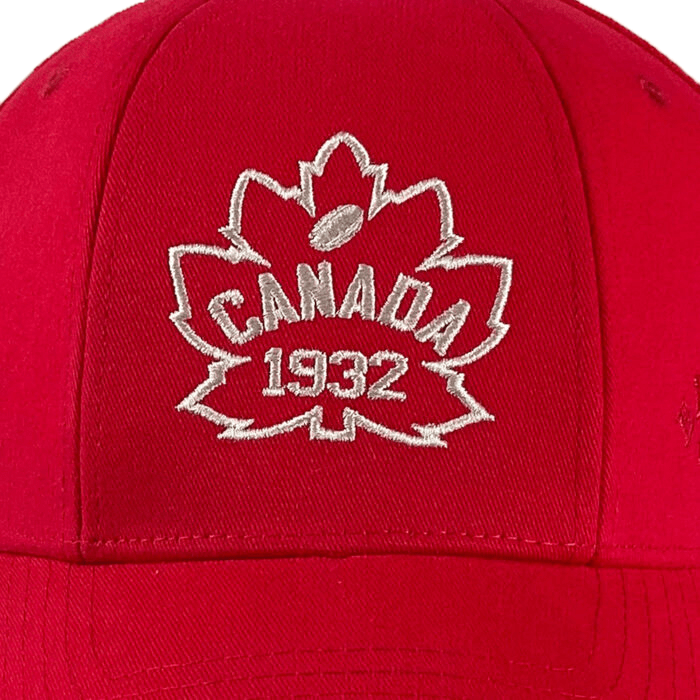 Ellis Rugby Canada Rugby 1932 Cap: Red cap featuring a white embroidered maple leaf with "CANADA 1932" stitched in the center, echoing the iconic 1932 style and Canadian rugby spirit.