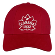 Ellis Rugby's Canada Rugby 1932 Cap is a red baseball cap with "CANADA 1932" and a white maple leaf design embroidered on the front, echoing the classic style of Ellis Rugby.