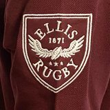 A maroon fabric polo with a white embroidered emblem featuring "Ellis Rugby" and "1871," a winged rugby ball, and three stars, evoking Queensland Rugby League history. This is the Queensland 1982 Vintage Rugby League Polo by Ellis Rugby.