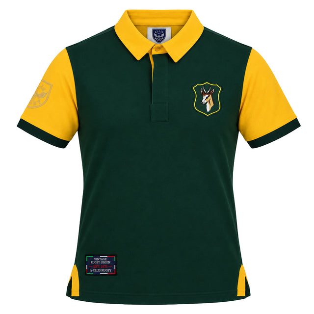 Show your support for the Springboks with the South Africa Rugby Polo 1924 by Ellis Rugby—a green and yellow short-sleeve polo featuring a classic collar, an embroidered crest on the left chest, a patch on the left sleeve, and a label at the bottom right front. Perfect for any passionate rugby fan.