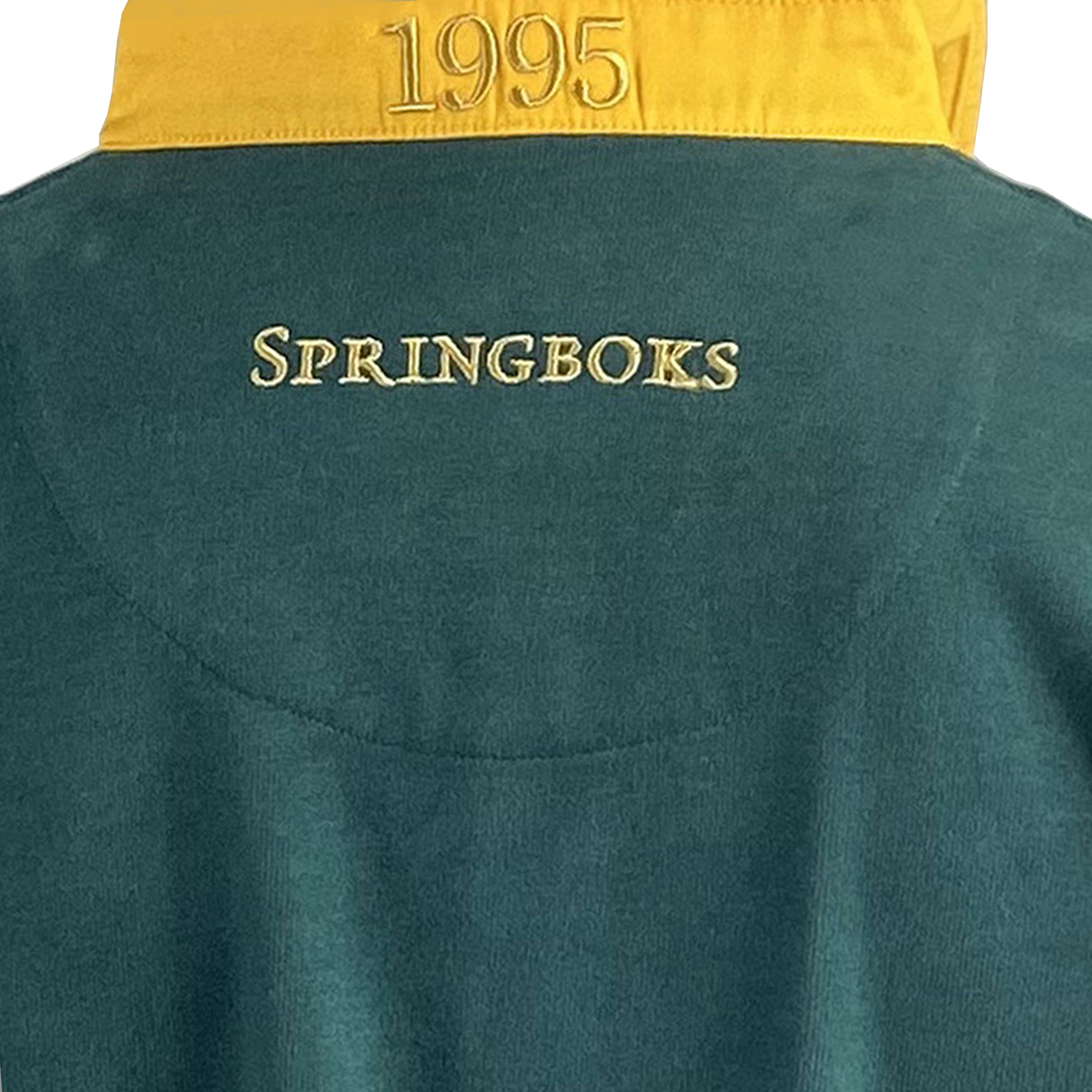 This green and yellow garment, the Ellis Rugby Springbok 1995 Vintage Long Sleeve Rugby Shirt, features "SPRINGBOKS" and "1995" embroidery celebrating South Africa's rugby heritage.