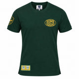 A green short-sleeved South Africa Bomb Squad Rugby T-Shirt by Ellis Rugby with a yellow “BOMB SQUAD” oval logo on the chest and patches on the sleeve and hem.