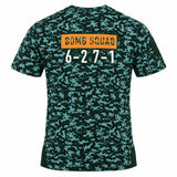 Back of a dark green camouflage Bomb Squad Bench T-Shirt by Ellis Rugby with the text “BOMB SQUAD 6-27-1” printed on the chest.