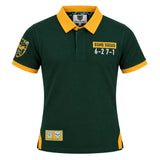 Ellis Rugby Bomb Squad Rugby Polo in dark green with a yellow collar and cuffs, featuring “BOMB SQUAD 6-27-1” text and rugby-themed patches.