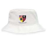 The Erie Rugby Club Crusher Bucket Cap by EMB S&S Activewear is a white cotton hat with a crest featuring American and British flags, a blue and yellow shield, and “THE RUGBY CLUB” text—ideal for sun protection at outdoor matches.