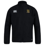 The Exiles Rugby Football Club Track Jacket by EMB Canterbury features the Canterbury logo on the right chest and a school crest on the left. This lightweight, water-repellent jacket is shown against a plain white background.