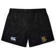 The Exiles Rugby Football Club Women's Yokohama Short by EMB Canterbury is a pair of black rugby shorts with a white Canterbury logo on the left leg and a green and gold "ENFIELD" school crest on the right.