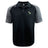 The EMB Canterbury Eagle High Mustangs Elite Polo features a black body, gray sleeves, three-button collar, Vapodri comfort fabric, a green and white chest crest, and the Canterbury logo on the shoulder.
