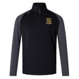 A black and dark gray EMB Canterbury Exiles Rugby Football Club Elite First Layer quarter-zip pullover featuring VapoDri technology and a crest with green and gold details on the left chest.