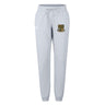 The EMB Canterbury Exiles Rugby Football Club Women's Leisure Sweatpant features light grey organic cotton, a drawstring waist, elastic cuffs, and a multicolored embroidered crest on the left thigh.
