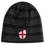 A black and gray striped beanie, with a red cross shield emblem, from EMB Canterbury's England Shield Beanie collection.