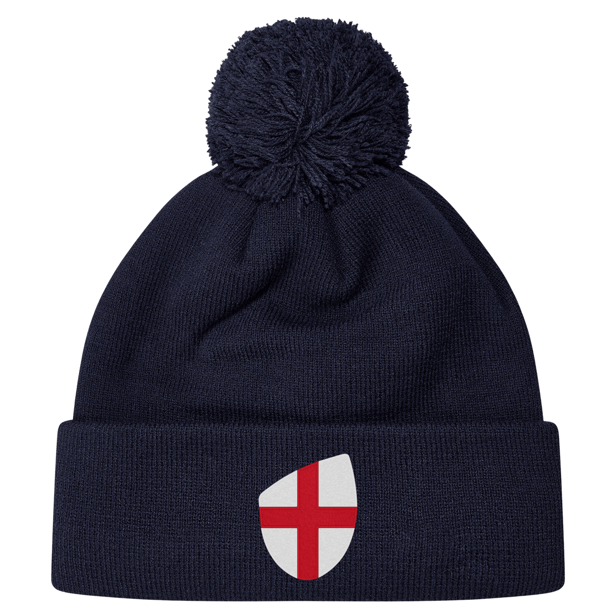 The England Shield Pom Pom Beanie by EMB Canterbury is a navy blue beanie featuring a prominent shield emblem with a red cross on a white background.