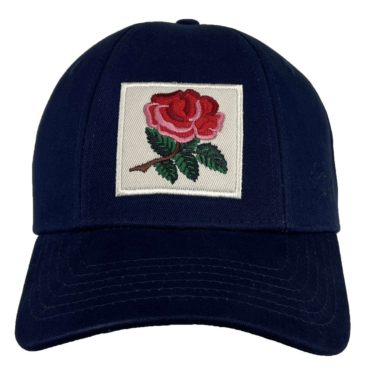 The Ellis Rugby England Rugby 1991 Six Nations Cap by Ellis Rugby features an embroidered red rose with green leaves on a square patch, made from organic cotton in navy.
