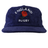 The EMB Weld Nations of Rugby England Corduroy Field Trip Cap features "ENGLAND RUGBY" and a red rose embroidered on blue corduroy—a classic vintage hat for true rugby fans.