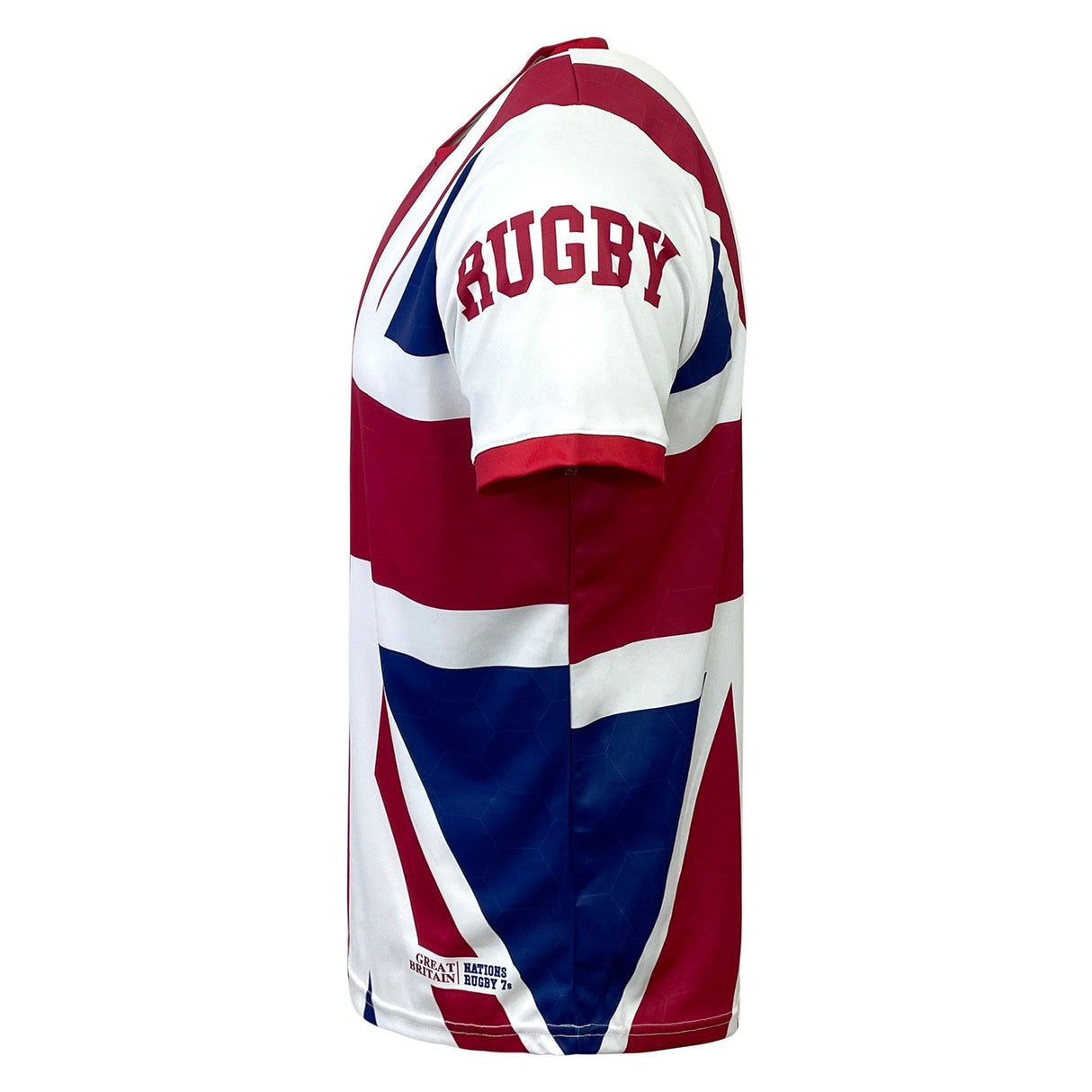 Side view of a white rugby shirt featuring large red and blue graphic elements and the word "RUGBY" displayed on the right sleeve—a perfect supporter jersey for Great Britain Sevens Rugby fans. The Nations of Rugby Great Britain Sevens Rugby Flag Jersey by Admiral is ideal for any dedicated fan.