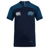 The King's Point Rugby Vapodri Evader Jersey by EMB Canterbury in navy blue showcases a white "Canterbury" logo and the "USMA Kings Point Rugby" text on its front. Designed with moisture-wicking technology, its VapoDri finish enhances comfort and performance during play.