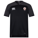 The West Potomac RFC Vapodri Evader Jersey by EMB Canterbury features black short sleeves, dark grey sleeves, a rugby crest on the left chest, a Canterbury logo on the right, and moisture-wicking technology—ideal for Rugby World Cup fans.
