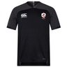 The West Potomac RFC Vapodri Evader Jersey by EMB Canterbury features black short sleeves, dark grey sleeves, a rugby crest on the left chest, a Canterbury logo on the right, and moisture-wicking technology—ideal for Rugby World Cup fans.