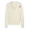 The France FFR 120 Year Cardigan by adidas is a cream rugby cardigan featuring two front pockets, button closure, and embroidered chest patches—an adidas logo and a bear on a unicycle—celebrating French rugby heritage.