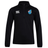 The Fiji Club Shield 1/4 Zip Training Top by EMB Canterbury is a black training feature with the Canterbury logo on the right chest and a blue shield with a Fiji emblem on the left. It's ideal for fans seeking style and functionality in their tops.