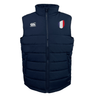 The EMB Canterbury France Shield Core Gilet, a navy blue padded vest with Thermoreg Insulation, features a high collar and front zipper. A logo adorns the left chest, while a red, white, and blue patch decorates the right. Ideal for warmth and style.