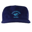 The EMB Weld Nations of Rugby Argentina Corduroy Field Trip Cap features "ARGENTINA RUGBY" and a puma head logo in light blue embroidery on navy, blending classic corduroy style with national rugby pride.