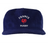 The EMB Weld Nations of Rugby France Corduroy Field Trip Cap is a blue 5-panel hat with "FRANCE RUGBY" and a red rooster logo embroidered on the front, celebrating France’s rugby heritage.
