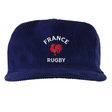 The EMB Weld Nations of Rugby France Corduroy Field Trip Cap is a blue 5-panel hat with "FRANCE RUGBY" and a red rooster logo embroidered on the front, celebrating France’s rugby heritage.