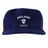 The EMB Weld Nations of Rugby Ireland Corduroy Field Trip Cap is a navy blue cap with white "Ireland Rugby" embroidery and a shamrock crest on the front.