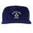 The EMB Weld Nations of Rugby Scotland Corduroy Field Trip Cap is a navy blue cap with "Scotland Rugby" and a white thistle emblem embroidered on the front—an ideal accessory for dedicated rugby fans.