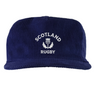 The EMB Weld Nations of Rugby Scotland Corduroy Field Trip Cap is a navy blue cap with "Scotland Rugby" and a white thistle emblem embroidered on the front—an ideal accessory for dedicated rugby fans.