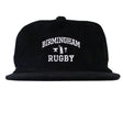 Introducing the EMB Weld Birmingham Rugby Text Logo Corduroy Field Trip Cap: a black corduroy snapback featuring “Birmingham Rugby” embroidered in crisp white lettering on the front. Blending timeless workwear aesthetics with modern comfort, this cap is the perfect choice for fans who love a classic look and easy fit.