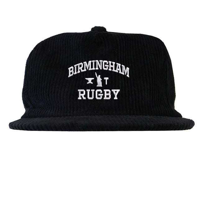 Introducing the EMB Weld Birmingham Rugby Text Logo Corduroy Field Trip Cap: a black corduroy snapback featuring “Birmingham Rugby” embroidered in crisp white lettering on the front. Blending timeless workwear aesthetics with modern comfort, this cap is the perfect choice for fans who love a classic look and easy fit.