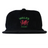 The EMB Weld Nations of Rugby Wales Corduroy Field Trip Cap is a black corduroy cap with a red Welsh dragon and "WALES RUGBY" embroidered in green and red—perfect for Wales Rugby fans.