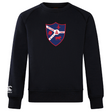 The ultra-soft black Fort Wayne Rugby Club Crew Sweatshirt by WRS Canterbury features a red and white shield with a fleur-de-lis, lion, and ship alongside "Fort Wayne RFC 1969," plus an embroidered CCC logo on the sleeve.