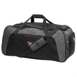 The Fort Wayne Rugby Holdall Duffle Bag by EMB Canterbury is a stylish black and gray sports bag, boasting a water-repellent finish and an adjustable shoulder strap for comfort. A small patch adds style to its practical design.