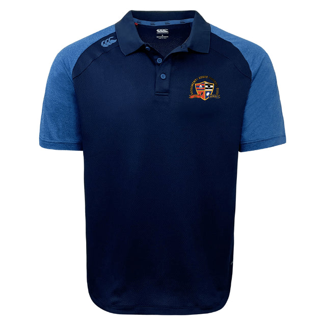 The Sacramento Rugby Football Club Elite Polo by EMB Canterbury features lighter blue sleeves, a buttoned collar, and a crest logo on the chest. Made with Vapodri fabrics, it keeps you cool and comfortable all day.